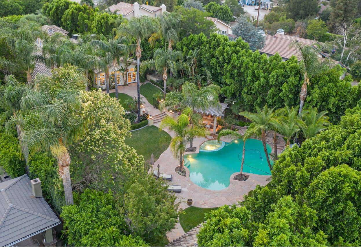 a photo of 4 seasons detox recovery center pool and backyard from an aerial view